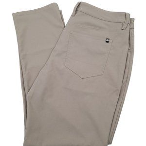 TRAVIS MATHEW MEN'S TAN CHINO STRETCH 100% POLYESTER GOLF CASUAL PANTS SIZE 35